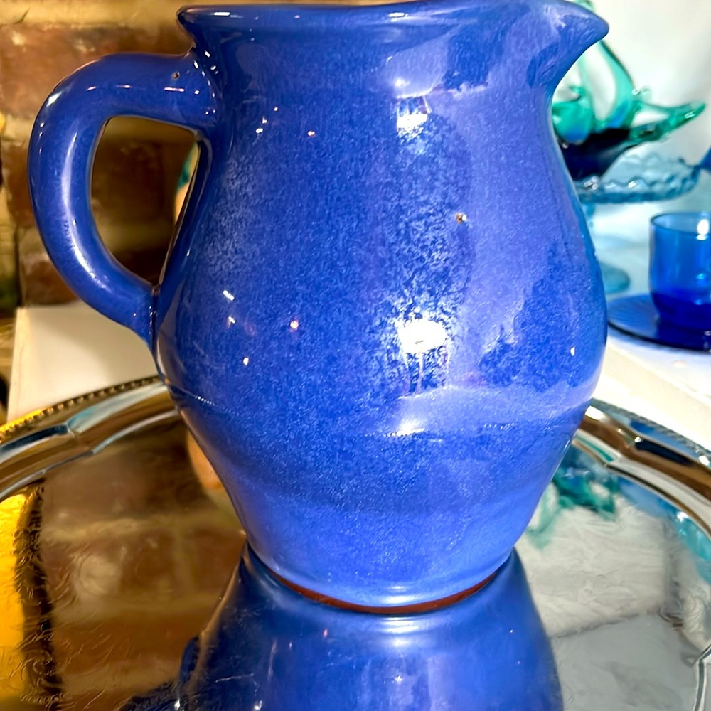 Blue pottery pitcher